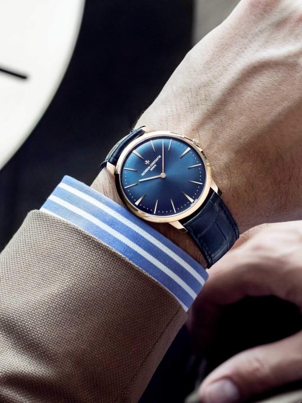A man's wrist wearing a Vacheron Constantin watch