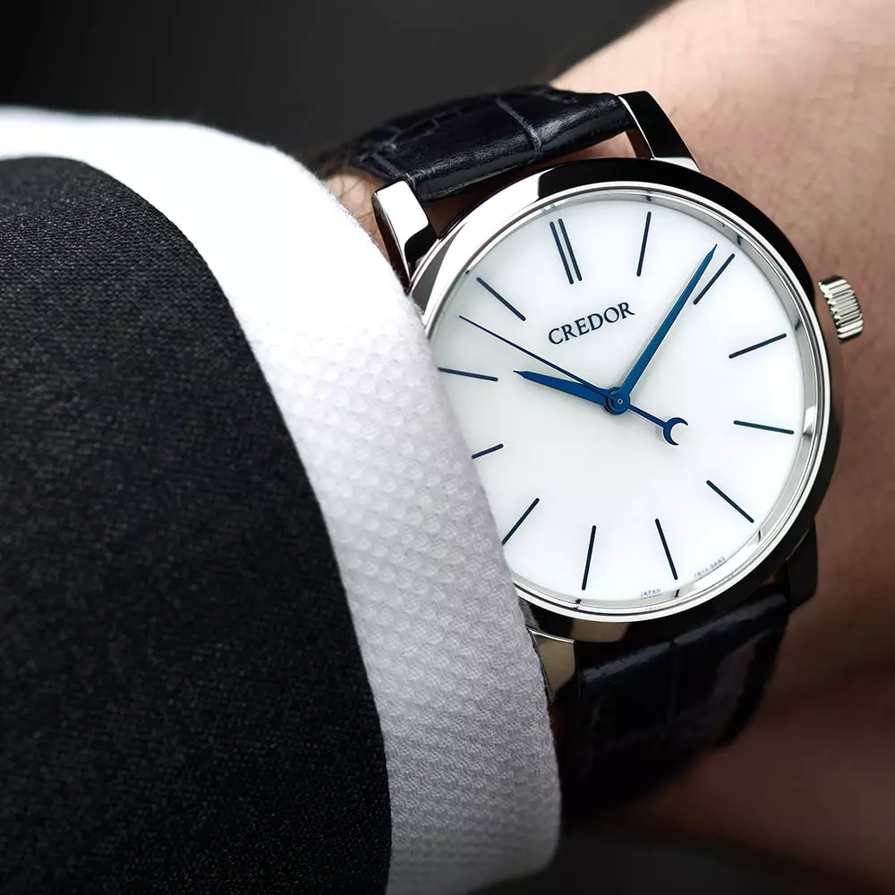 Close up of a man wrist wearing a Credor watch