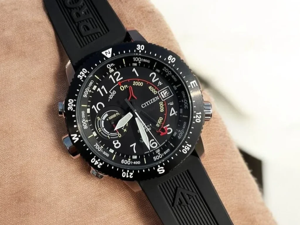 Citizen Promaster Altichron BN5058-07E resting on a beige fabric background.