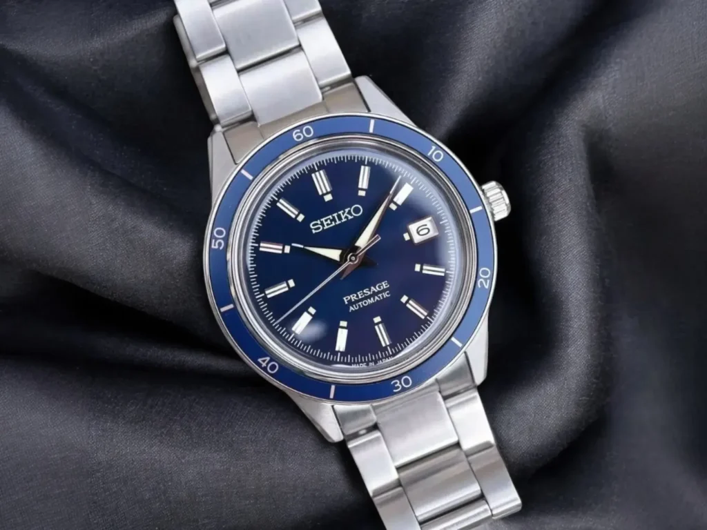 Seiko Presage SRPG05 dress watch centered on a dark gray fabric background in a well-lit, minimalist composition.
