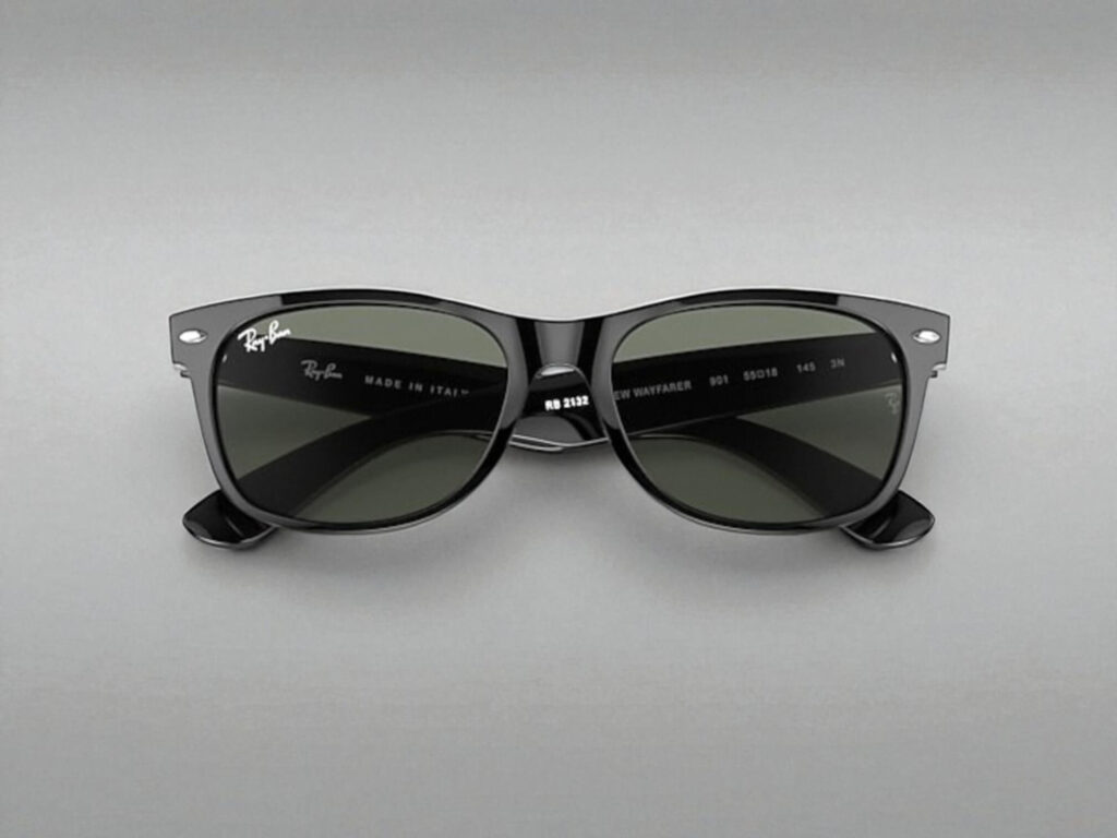 Ray-Ban New Wayfarer sunglasses with dark lenses on a neutral background.