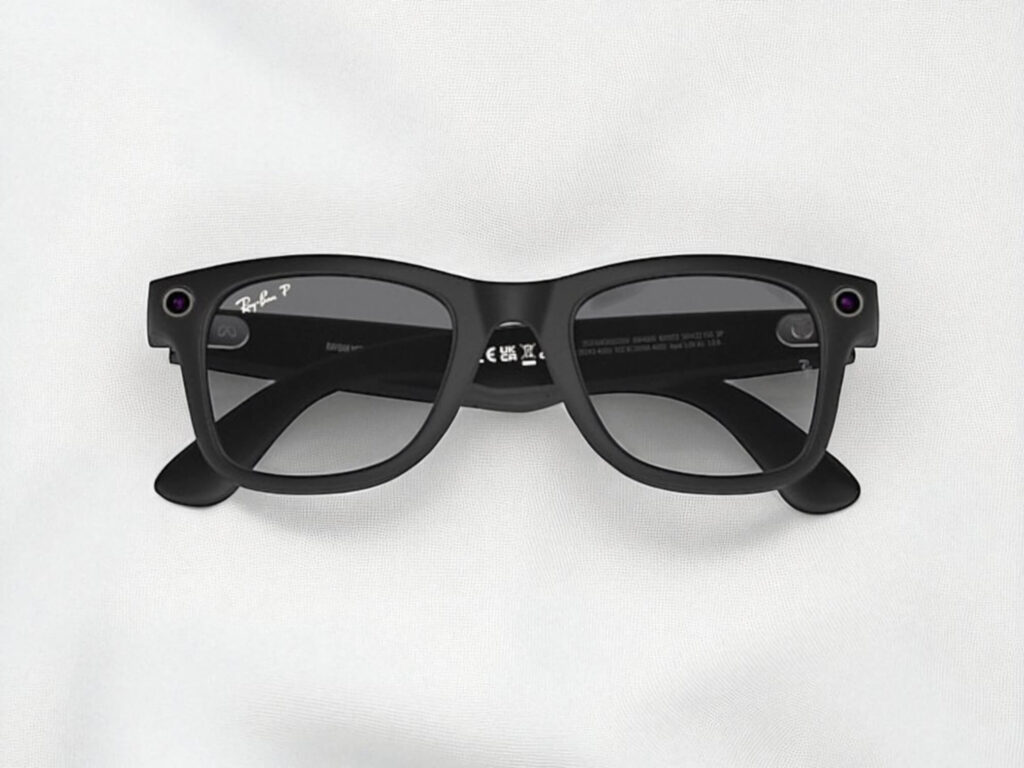 Black Ray-Ban smart sunglasses with a Wayfarer frame are displayed against a white background. 