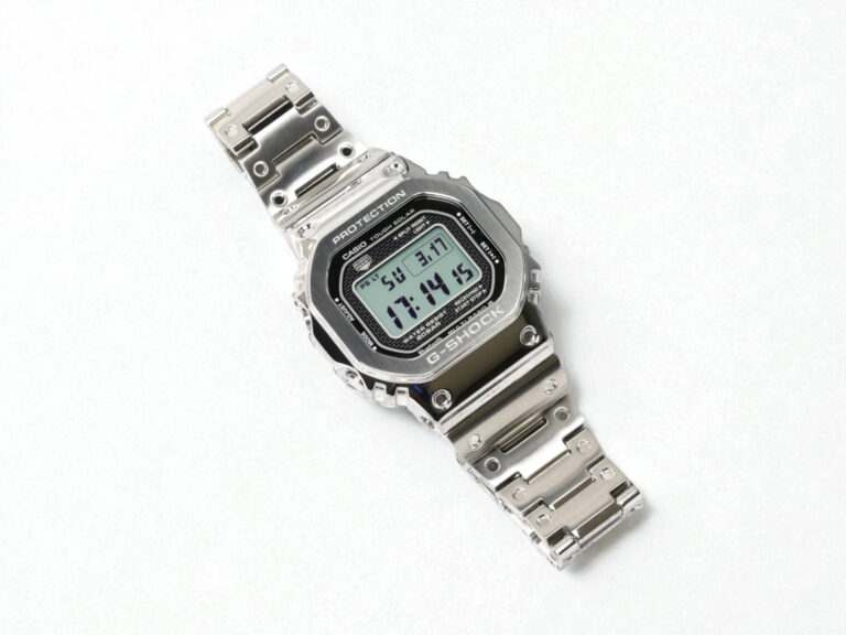 A silver G-Shock GMW-B5000D digital wristwatch with a metal strap on a plain white background.